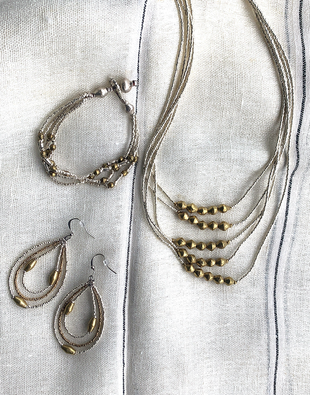 Tsedi Necklace, Sorse Bracelet & Mesrake Earrings Bundle